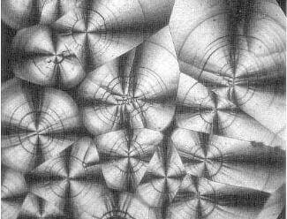 laminar structure of pyrolytic graphite, deposited on carbon filament