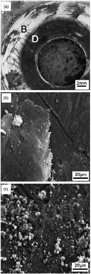 Fig.9-SEM micrographs showing two types of surface debris of sample P-M